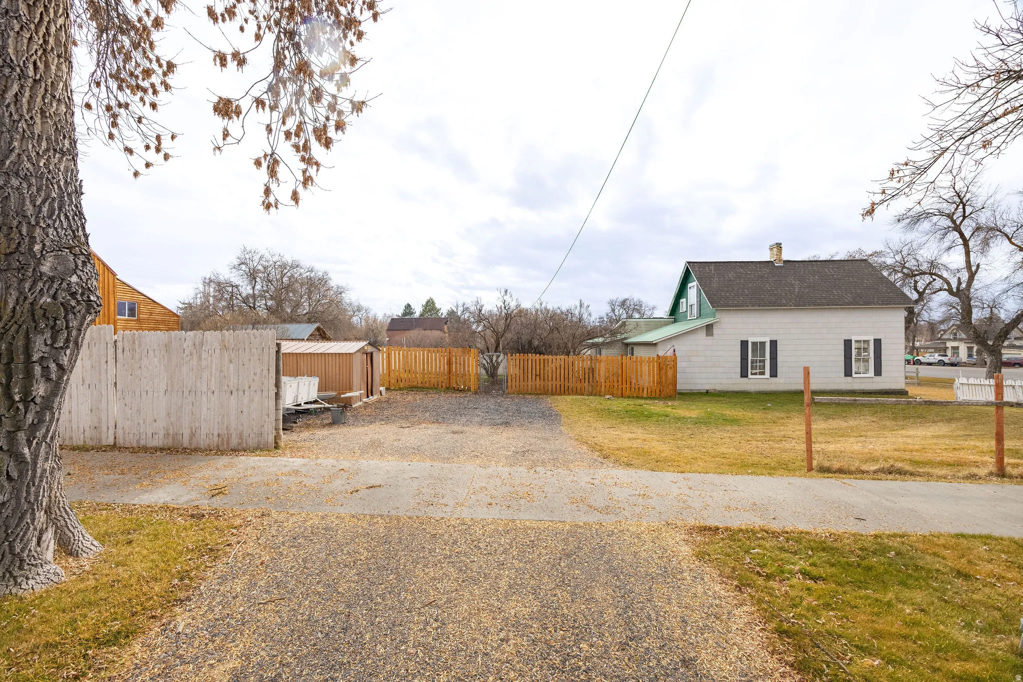 View of property exterior featuring a chimney