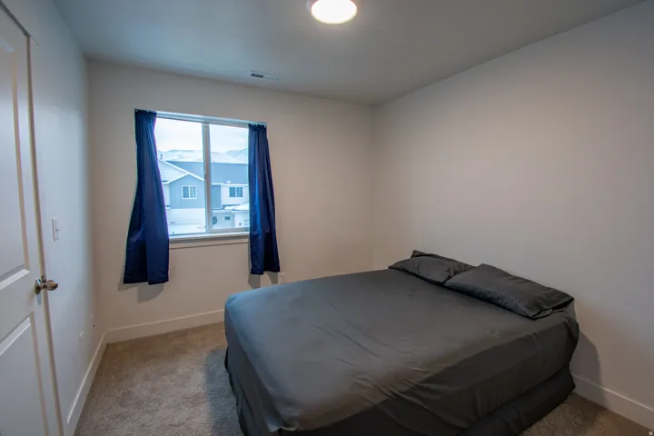 Bedroom featuring carpet