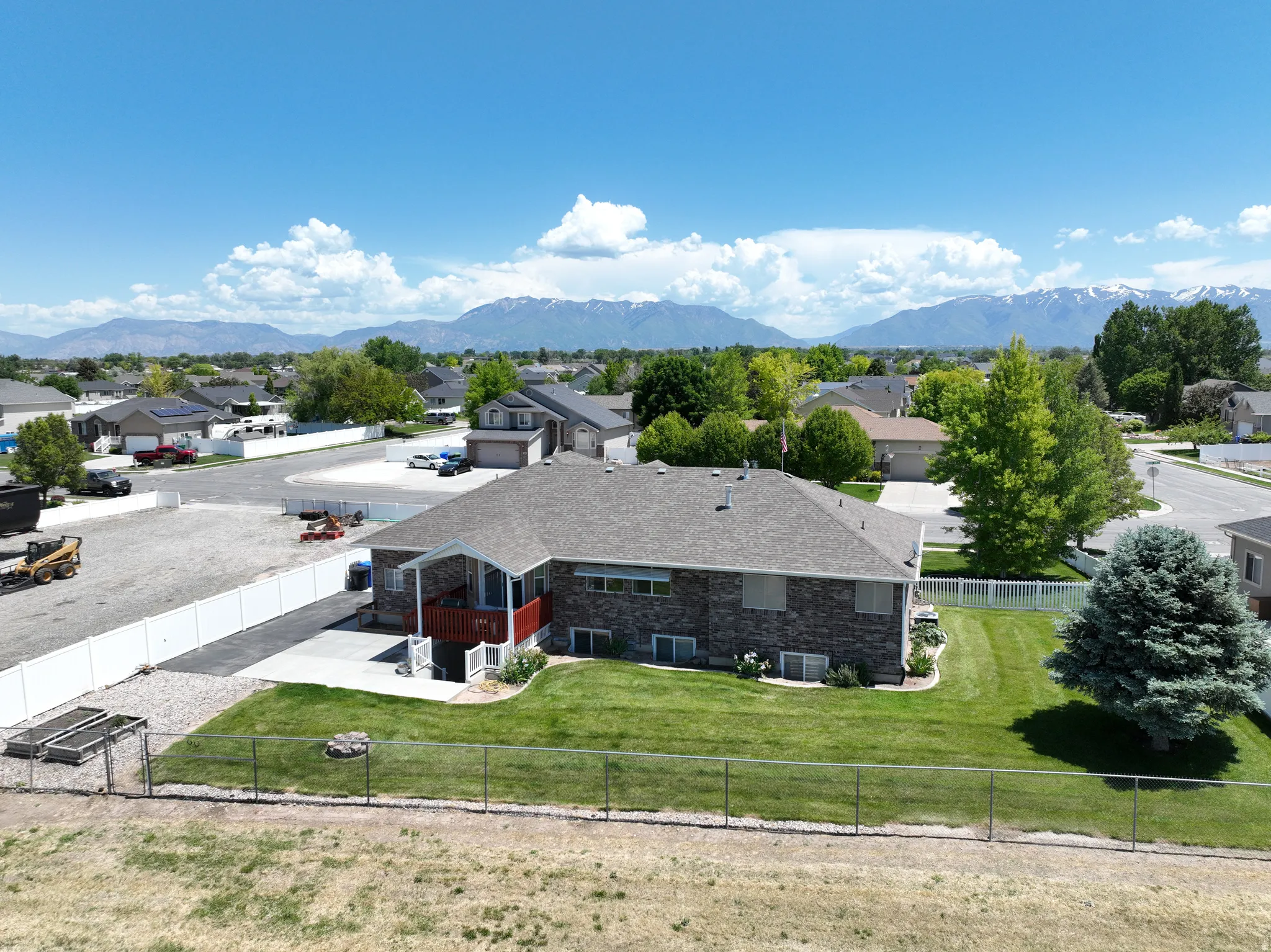 Aerial view of residential area featuring mountains