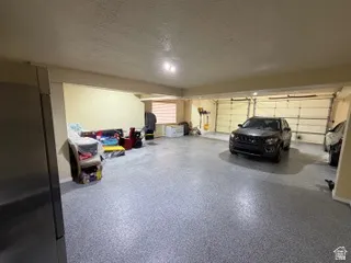 Parking garage with freestanding refrigerator