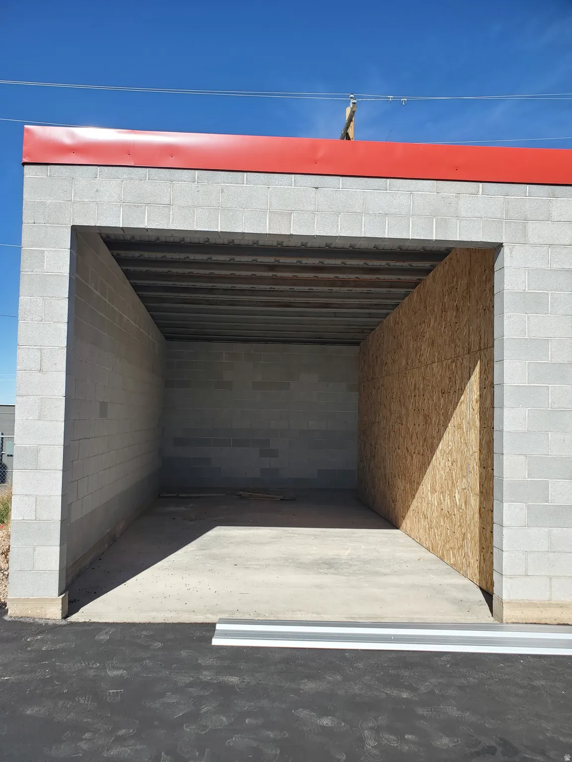 Garage with concrete block wall