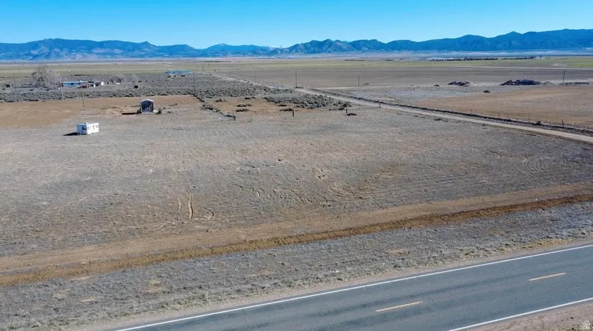 View of rural area with a mountain backdrop