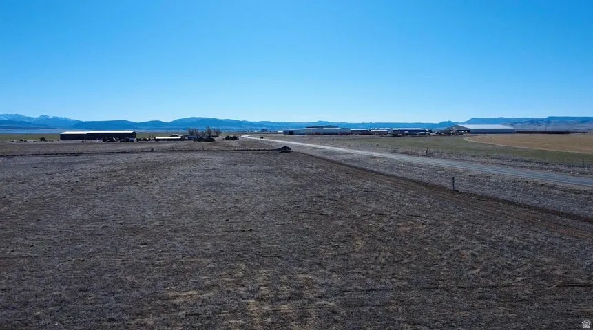 Water view featuring mountains and rural landscape