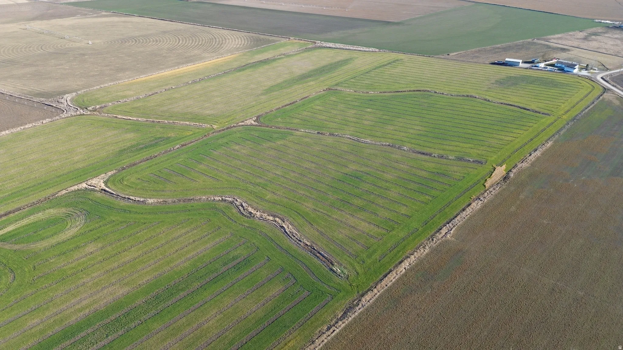 Aerial overview of property's location with rural landscape and abundant farmland