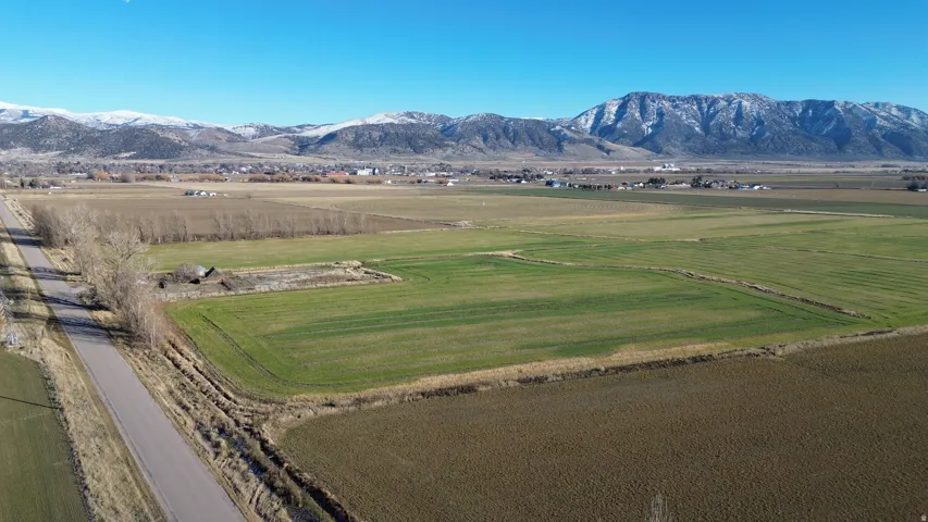 View of mountain background featuring rural landscape and extensive farmland