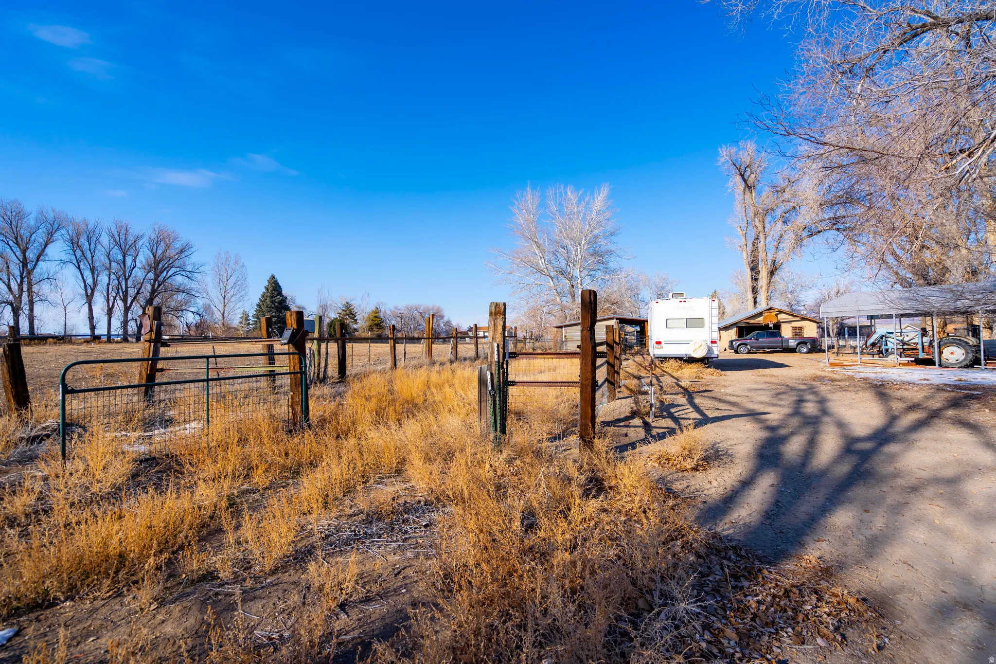 View of yard featuring a gate and a rural view