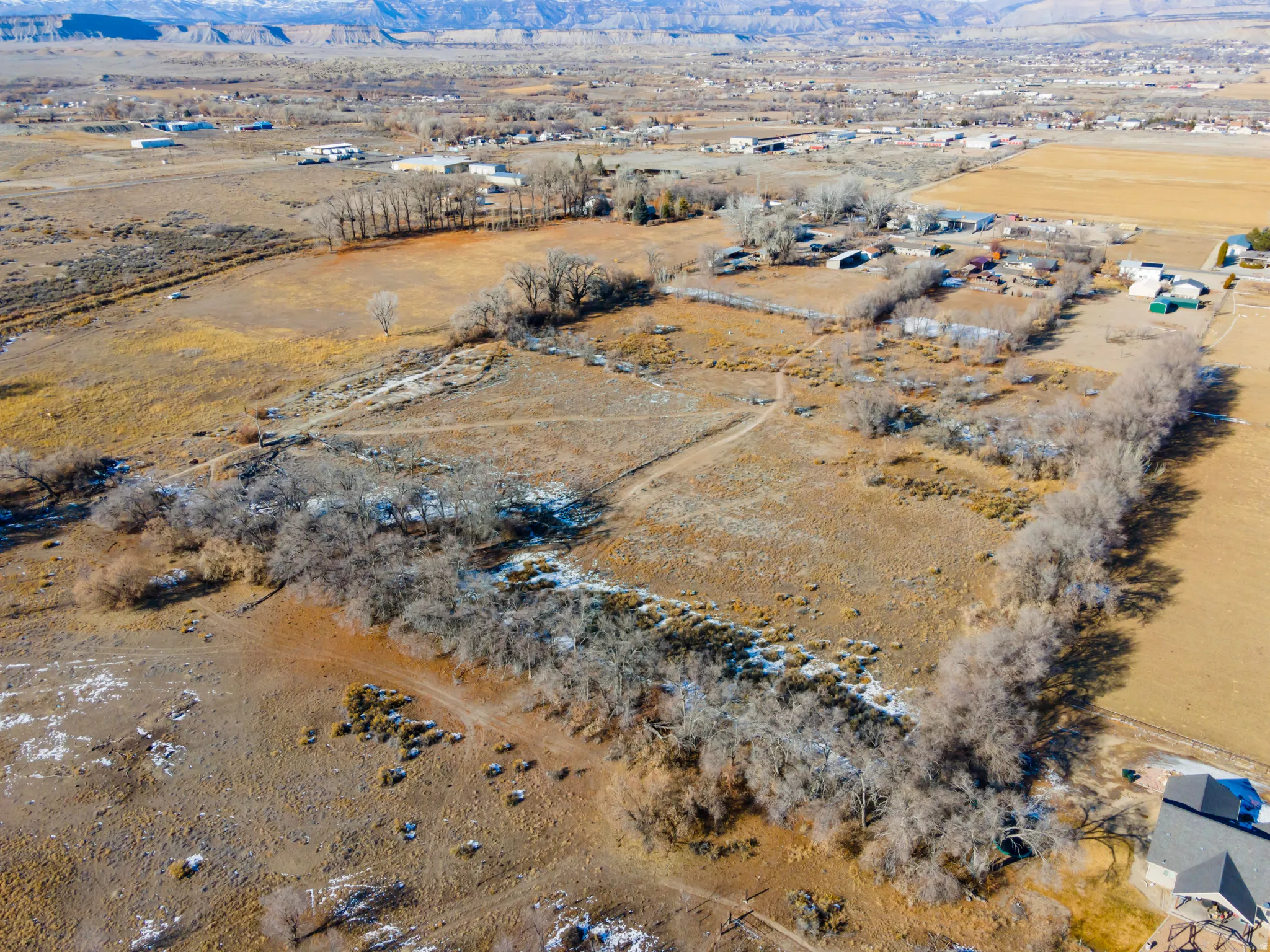 Aerial overview of property's location with mountains and rural landscape