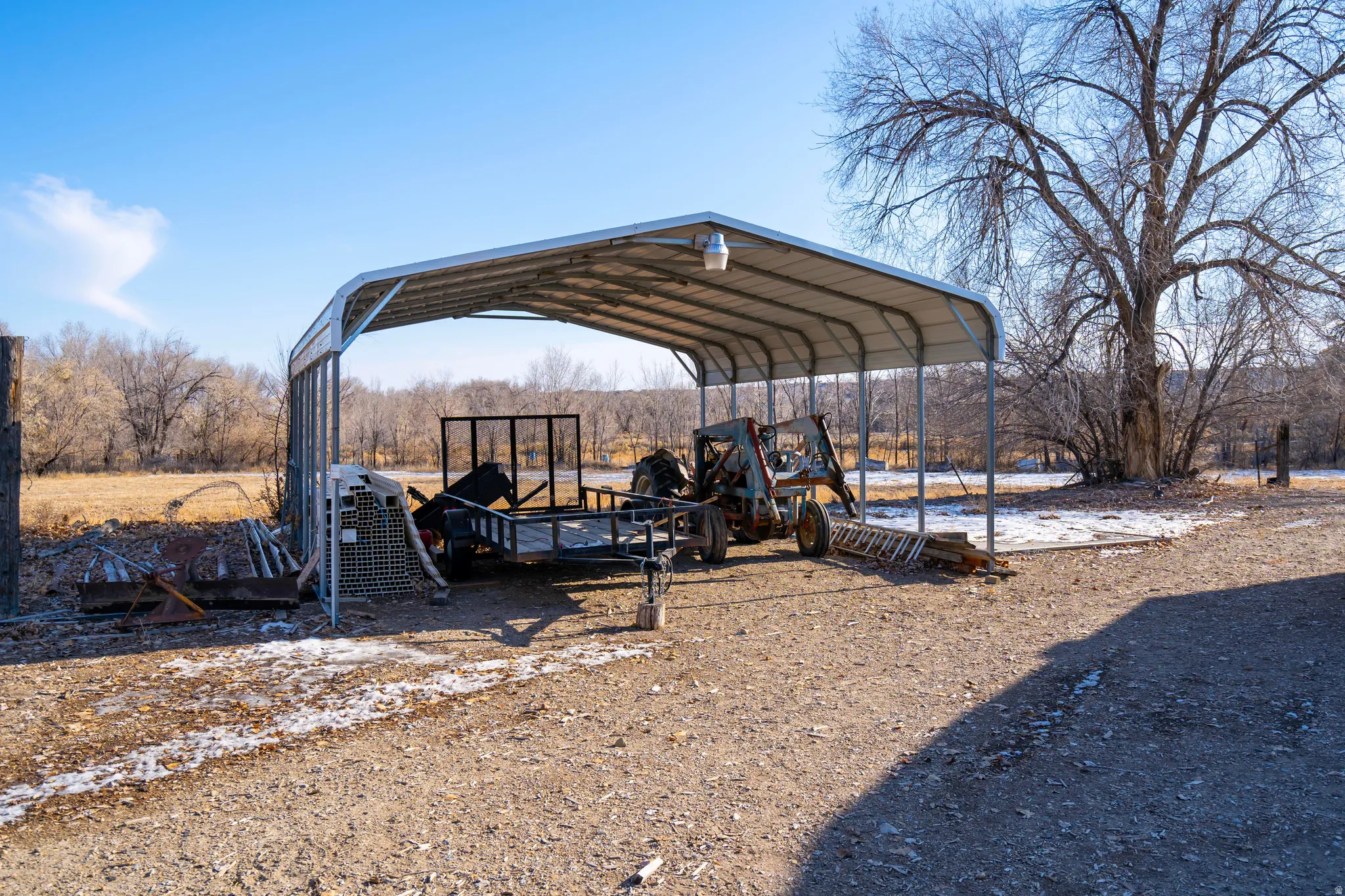 View of outdoor structure featuring a carport