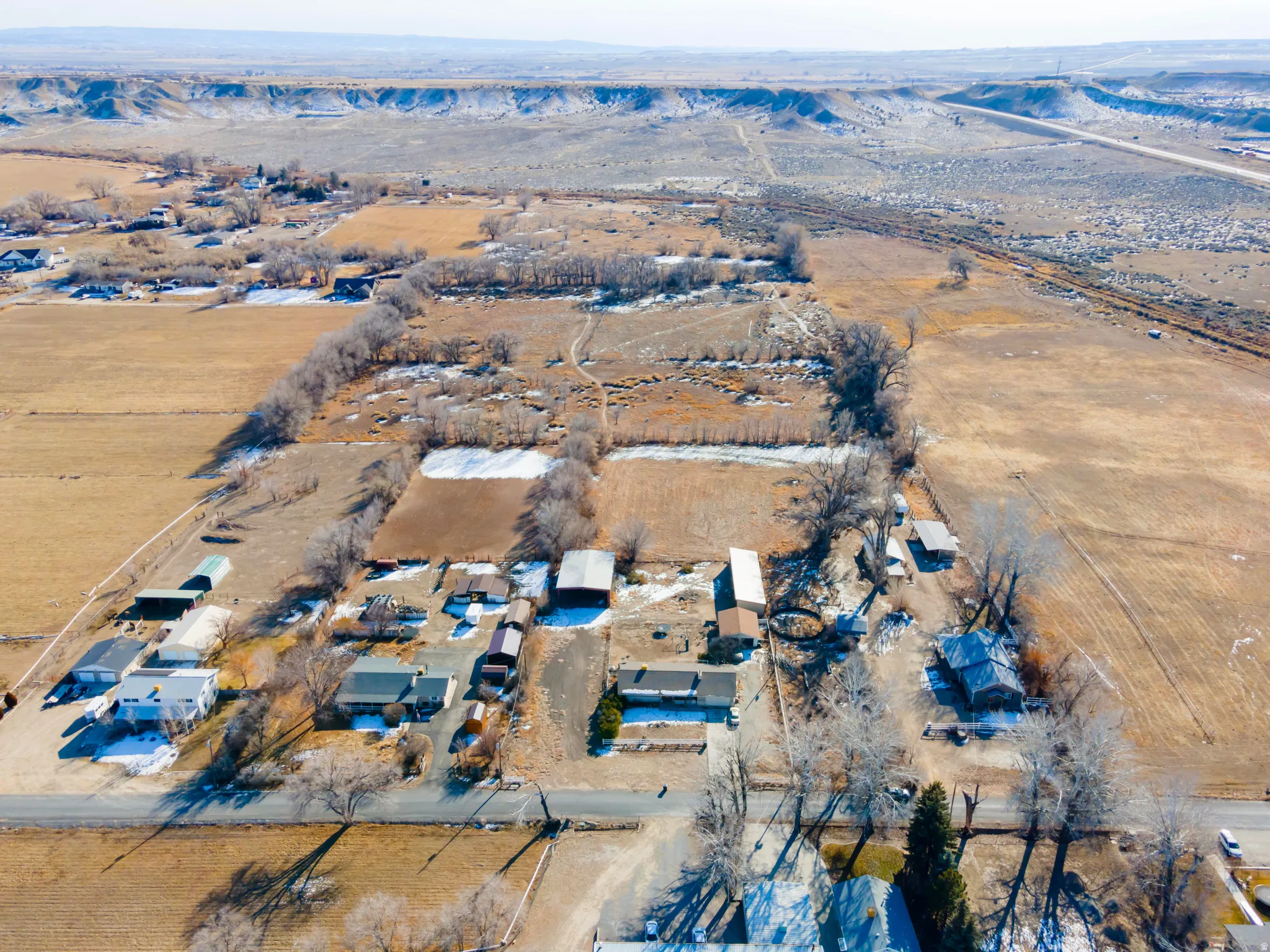 Aerial view of property and surrounding area with rural landscape