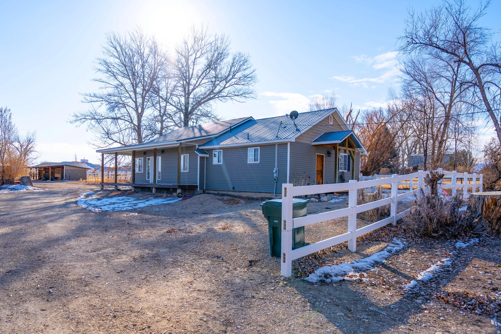 View of front of home featuring a metal roof