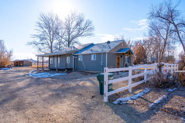 View of front of home featuring a metal roof