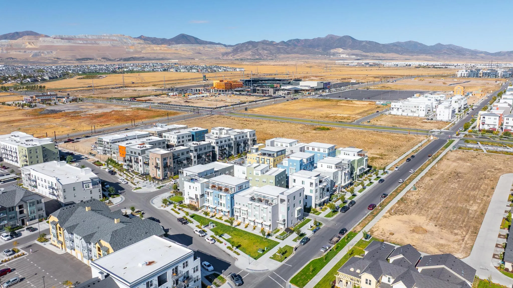 Bird's eye view of a mountainous background and industrial structures