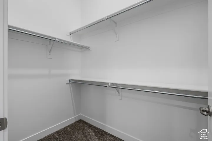 Walk in closet in the loft