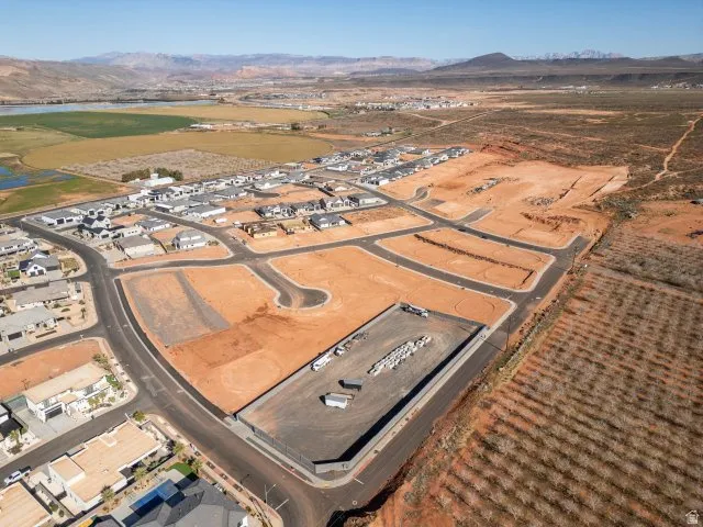 Aerial view of property's location with a mountainous background and rural landscape