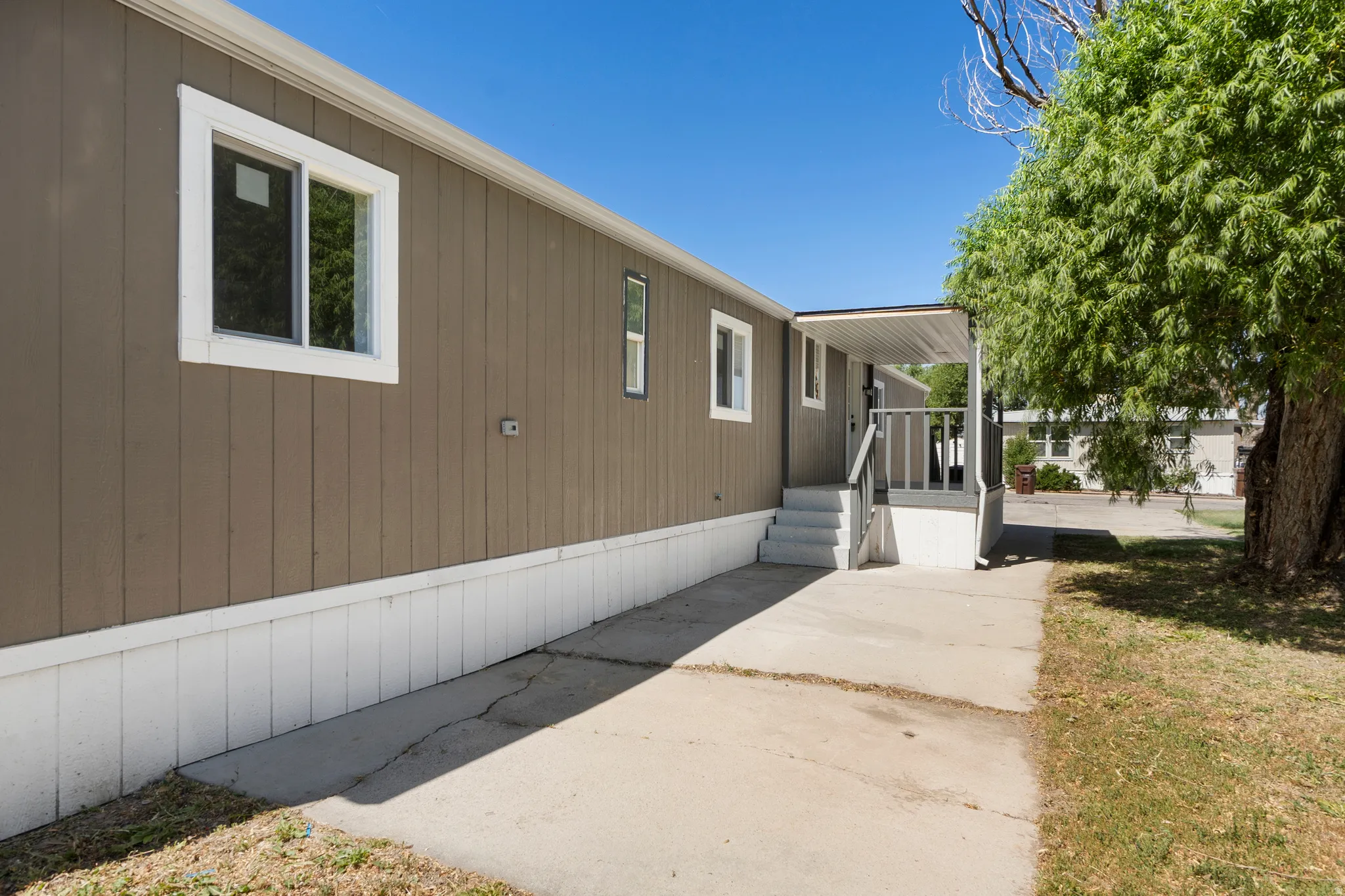 View of home's exterior featuring a yard
