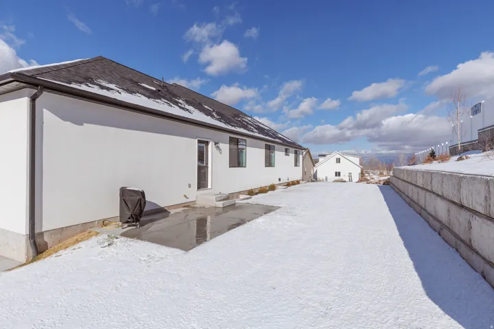 Rear of property featuring a patio area
