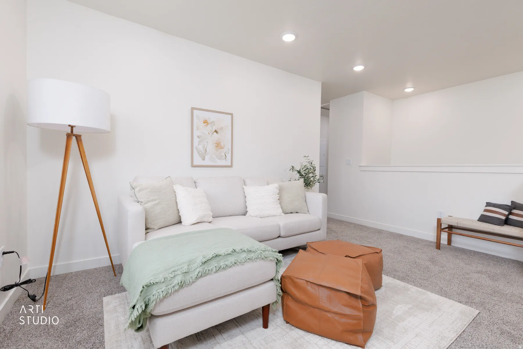Living room featuring light carpet and recessed lighting