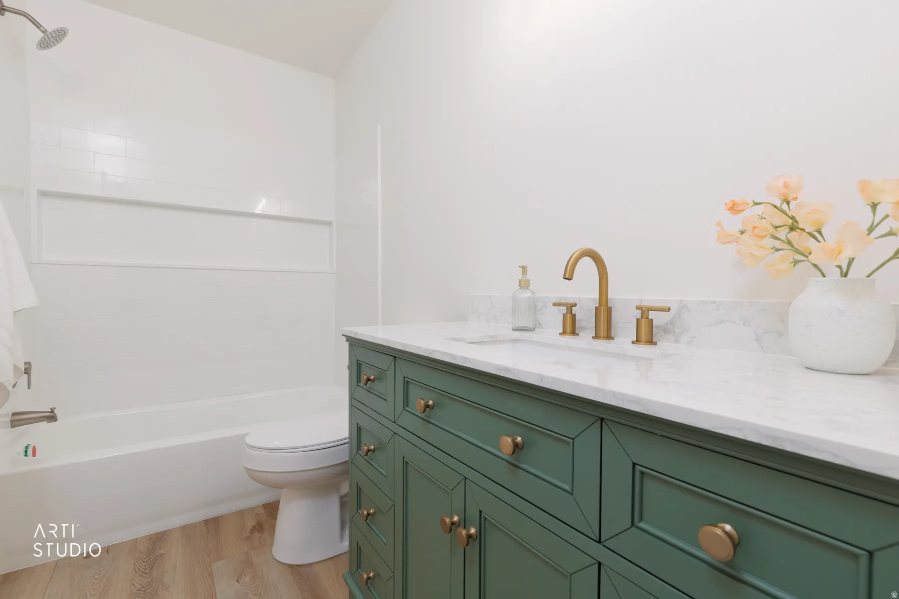 Bathroom with vanity, light wood-type flooring, and shower / bathtub combination