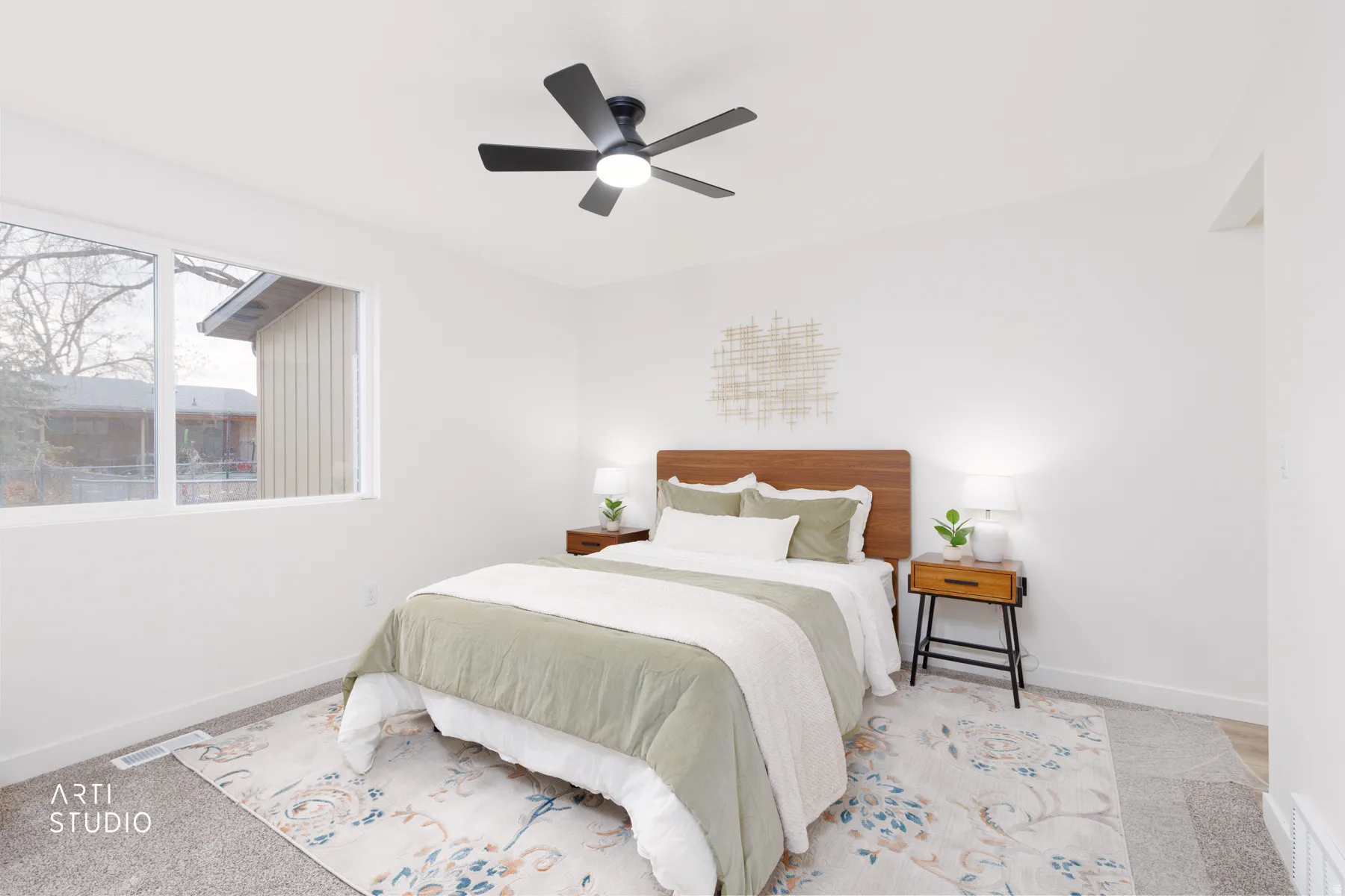 Bedroom with a ceiling fan and carpet flooring