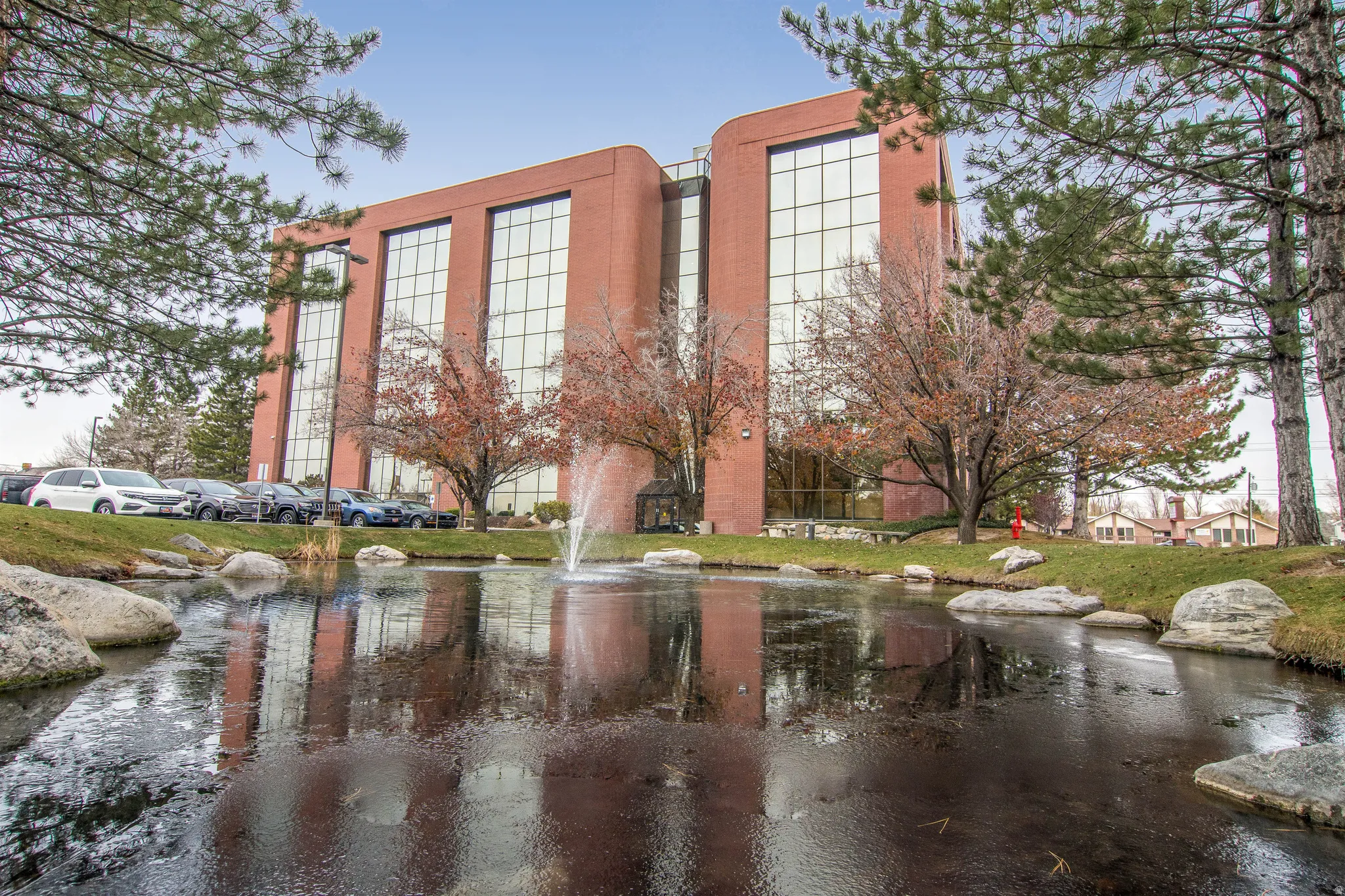 View of apartment building / complex with a water view