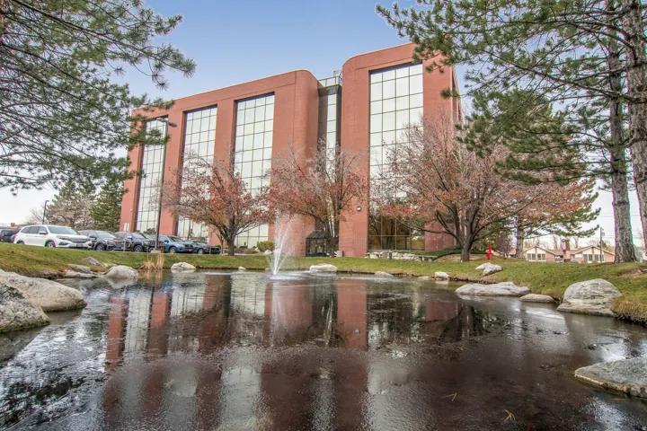 View of apartment building / complex with a water view