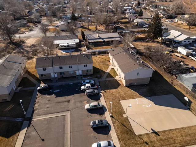 Aerial overview of property's location with nearby suburban area