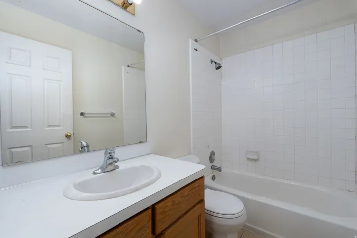 Full bathroom featuring washtub / shower combination and vanity