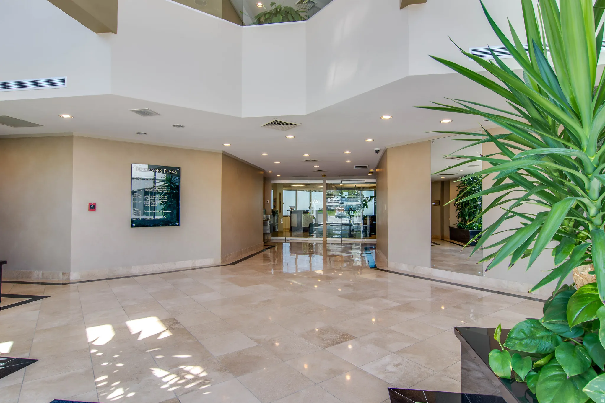 Lobby featuring recessed lighting and a high ceiling