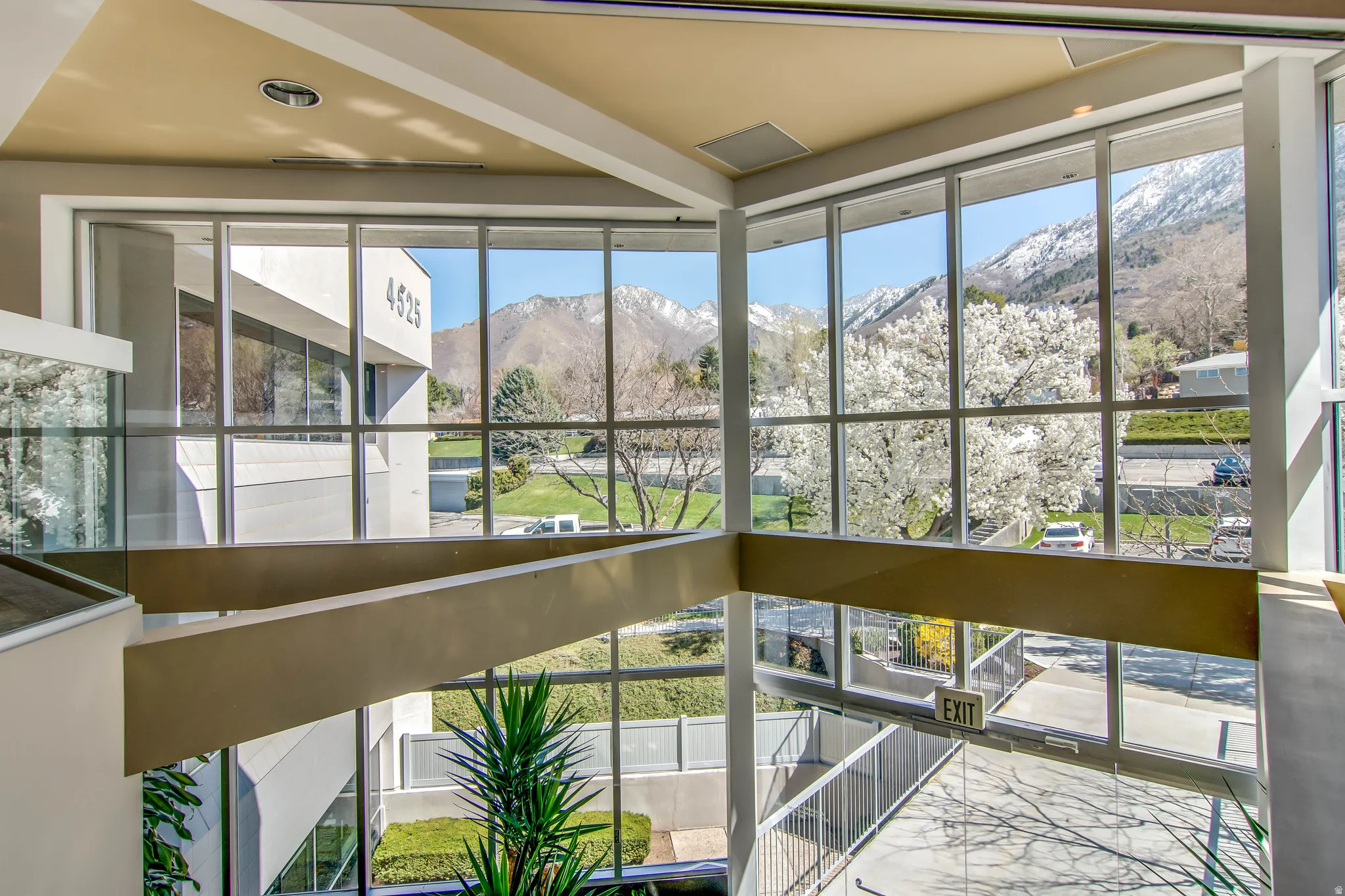 Unfurnished sunroom with a mountain view