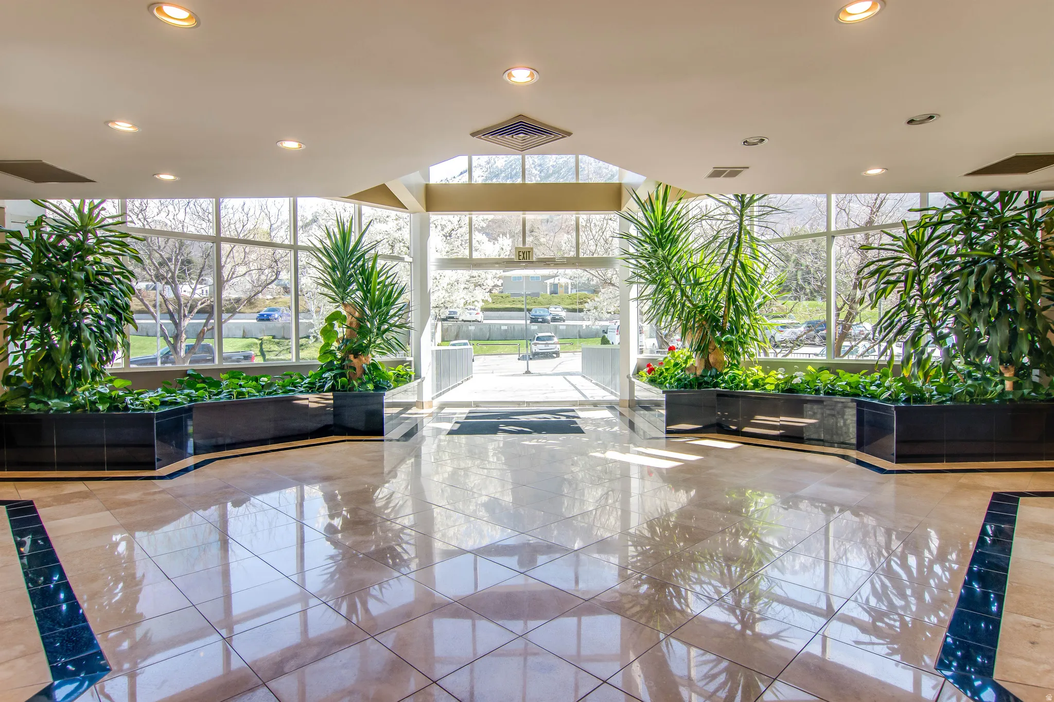 Community lobby featuring recessed lighting and floor to ceiling windows