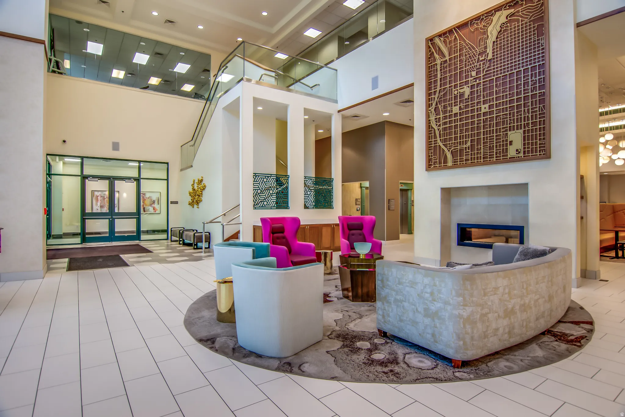 Community lobby with a high ceiling and recessed lighting