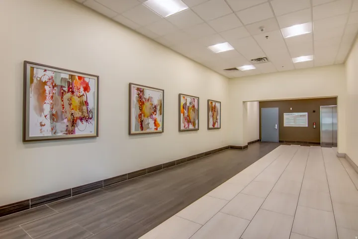 Common area with a high drop ceiling