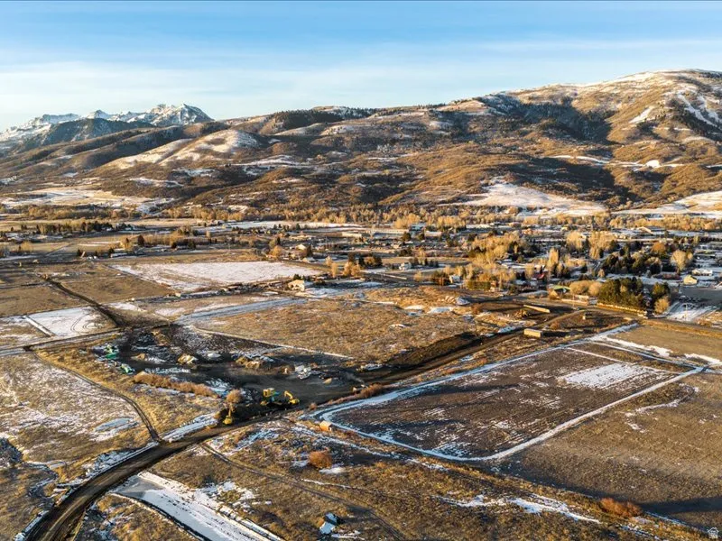 View of property location with a mountainous background and rural landscape