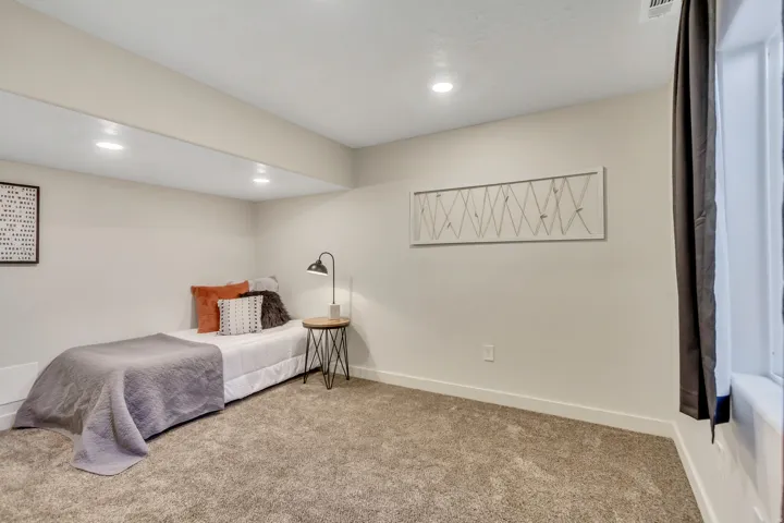 Bedroom featuring carpet floors and recessed lighting