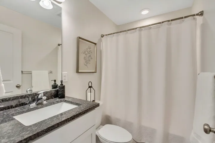 Bathroom featuring toilet and vanity