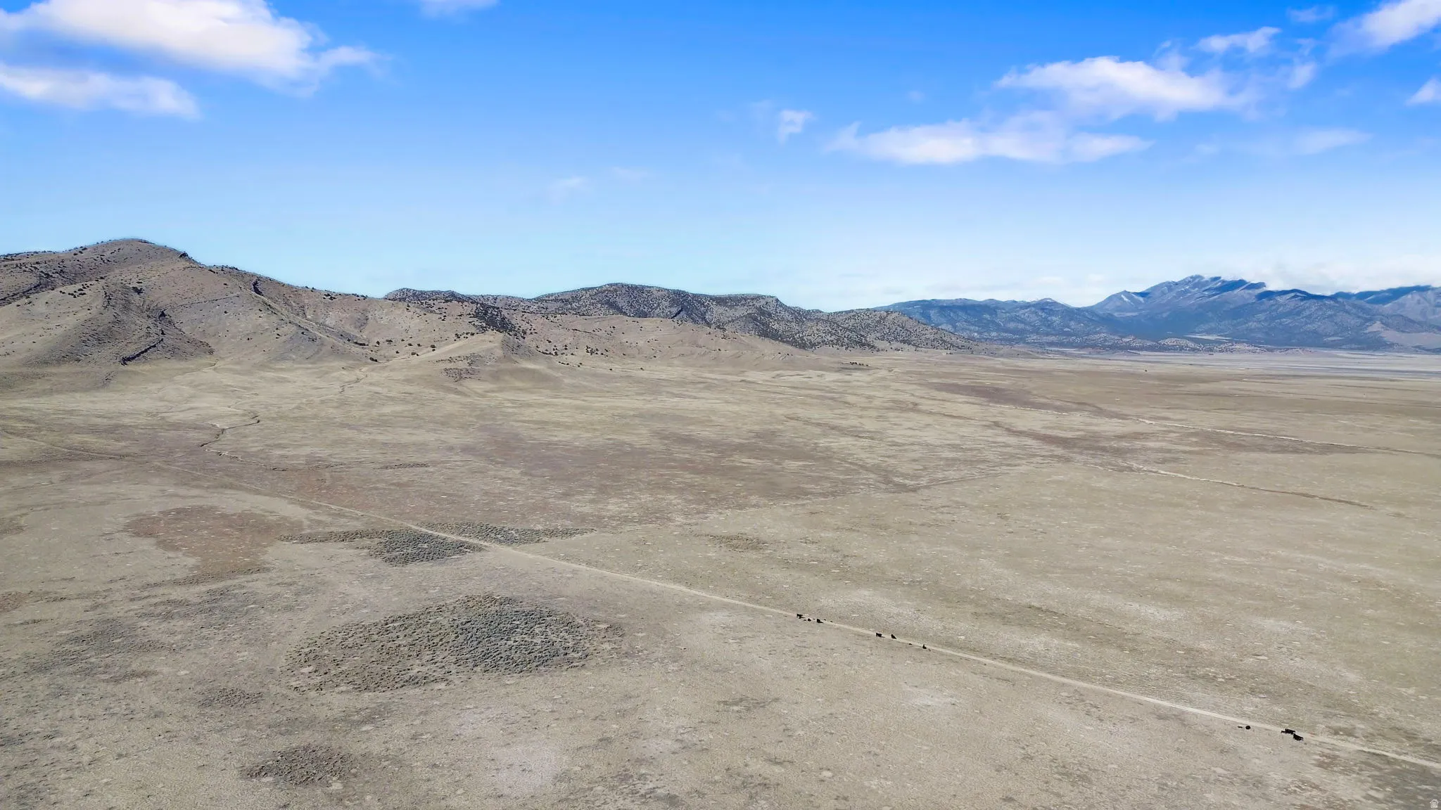 View of mountain background with rural landscape and a desert landscape