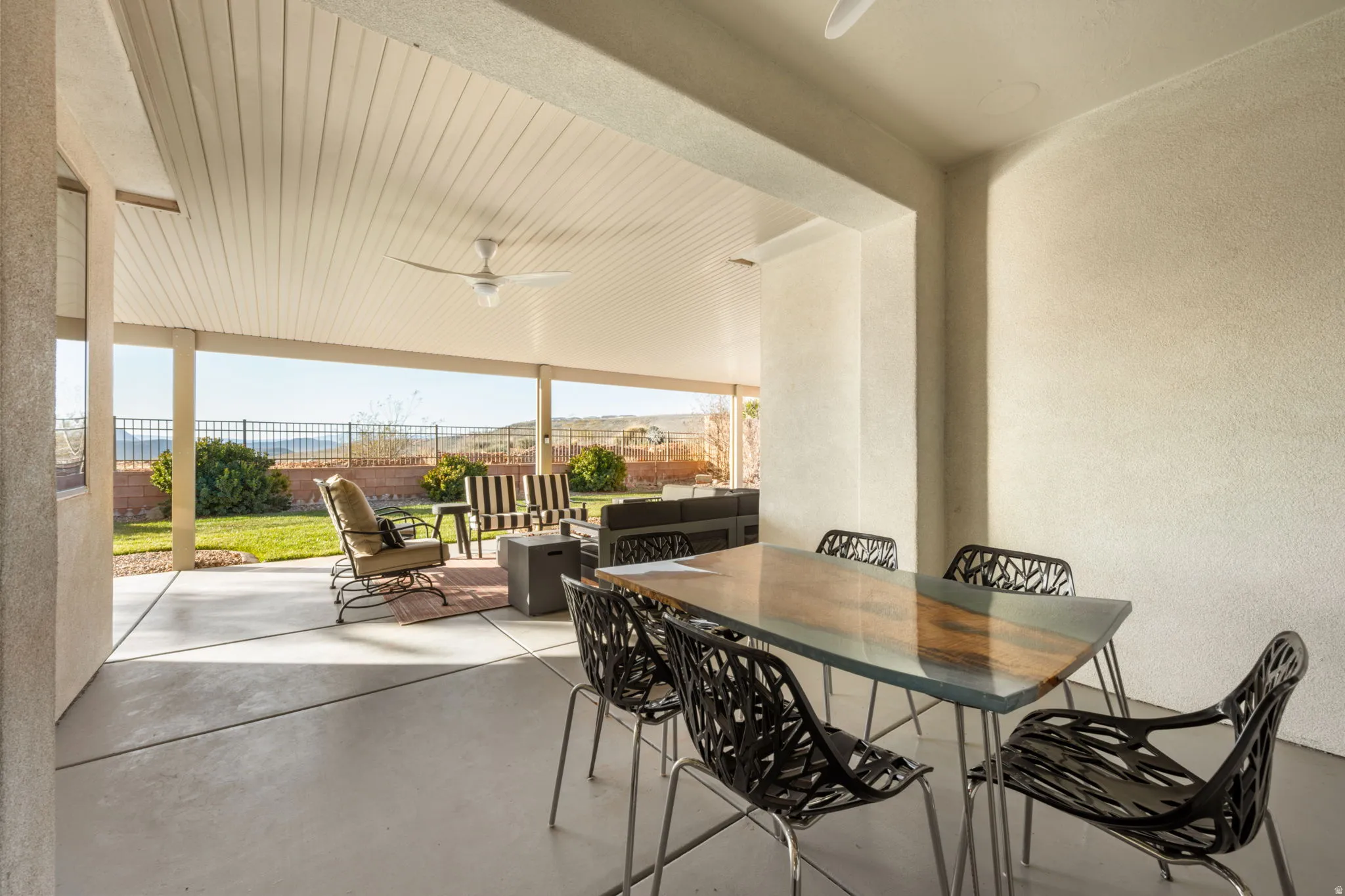 Expanded covered patio with ceiling fans
