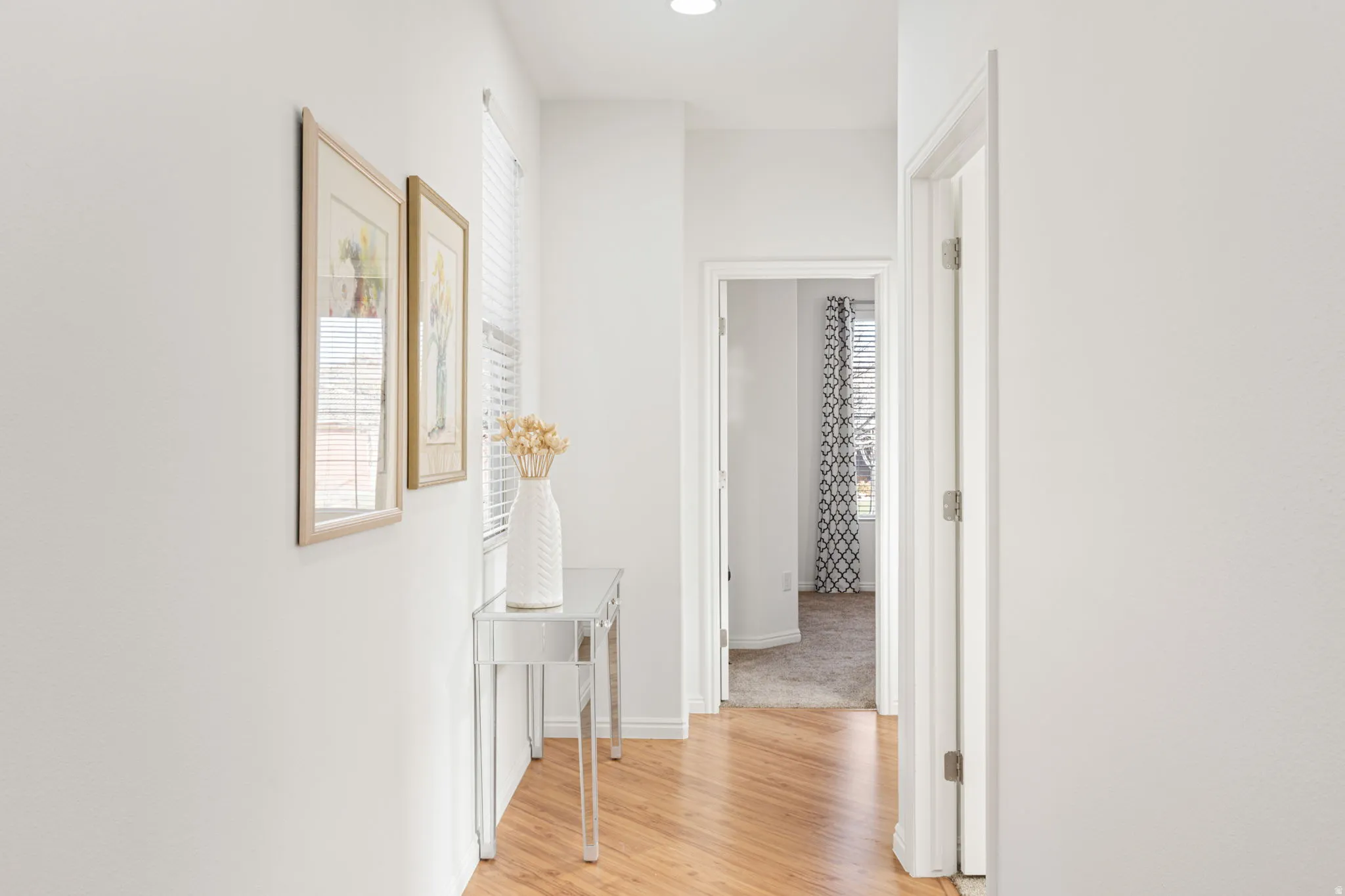 Split floor plan with hallway to bedrooms 2&3