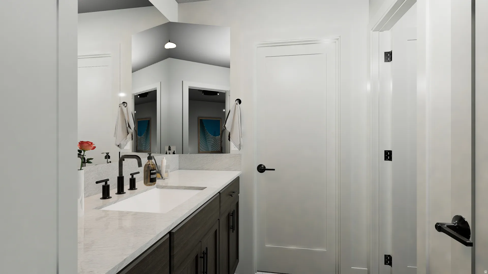 Primary bathroom with quartz vanity top and 3-way mirror