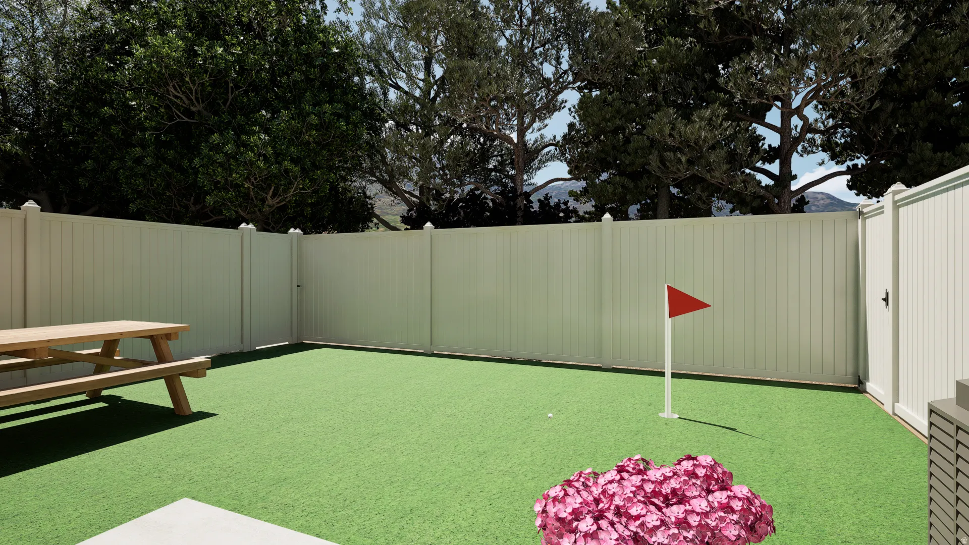 View of yard with a putting area and a gate