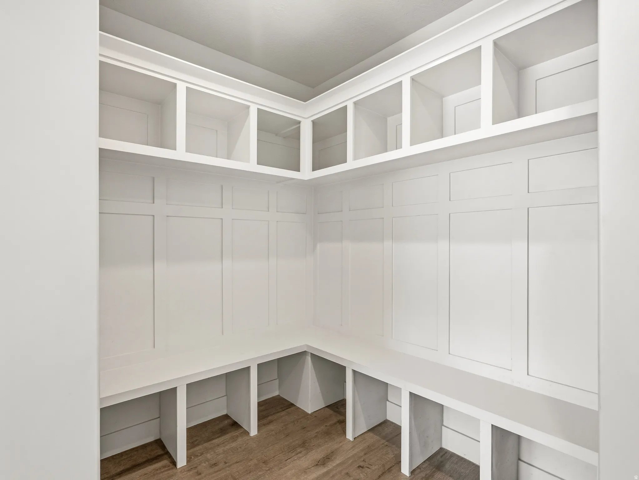 Mudroom featuring light wood-style flooring