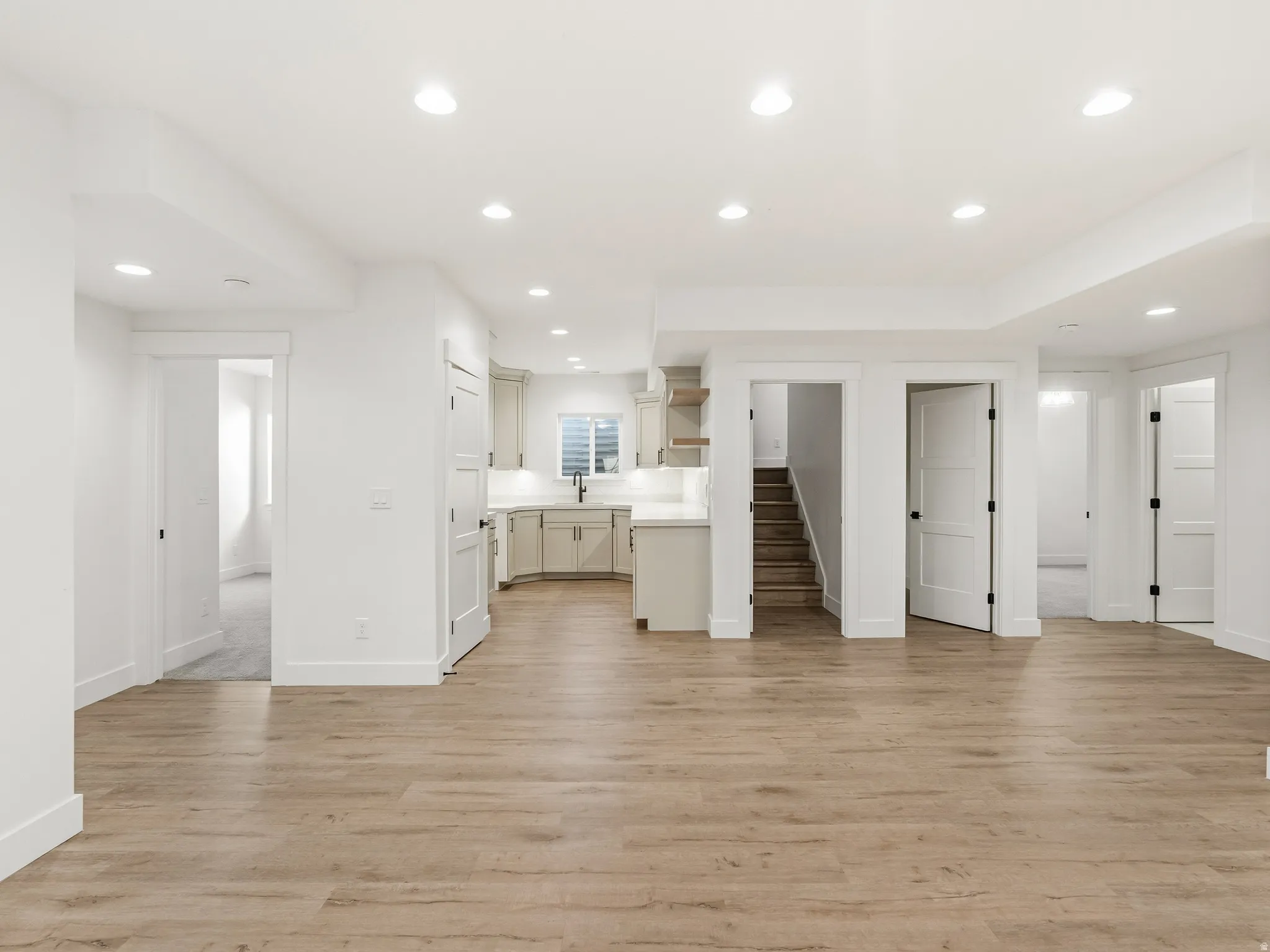Unfurnished living room with recessed lighting and light wood-style flooring