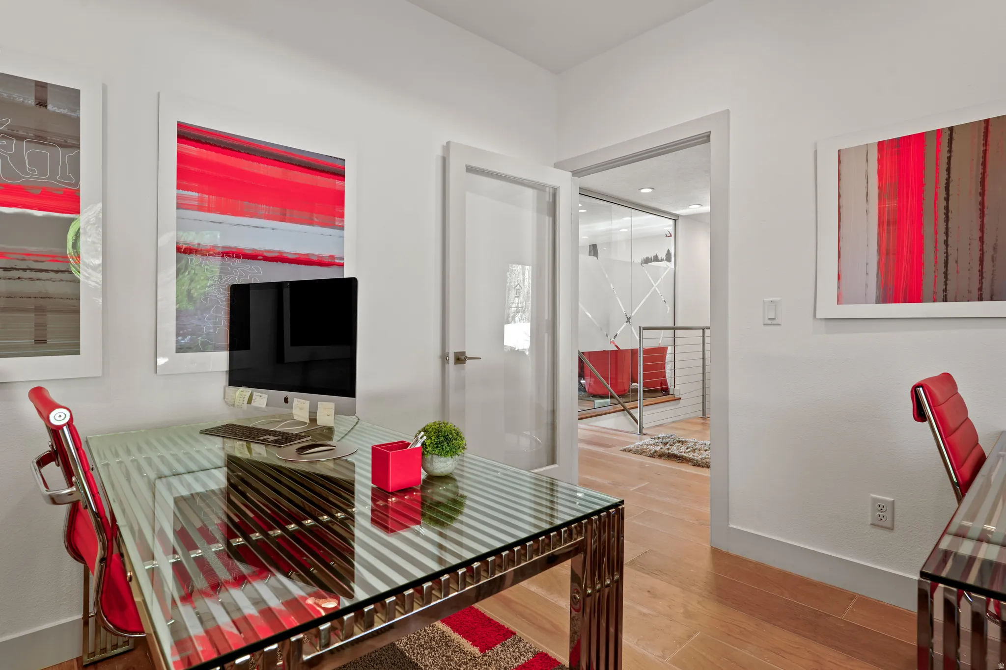 Living room featuring baseboards and wood finished floors