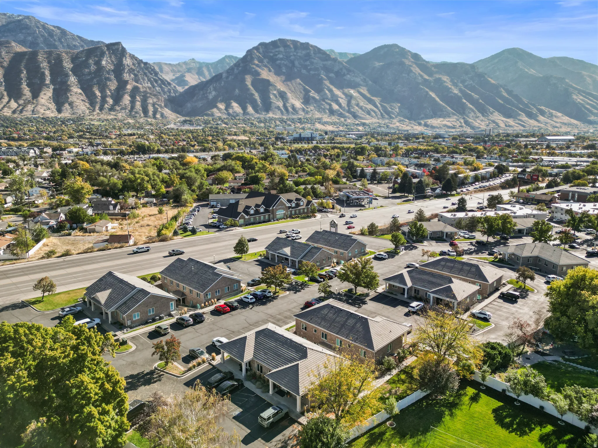 Aerial perspective of suburban area with mountains