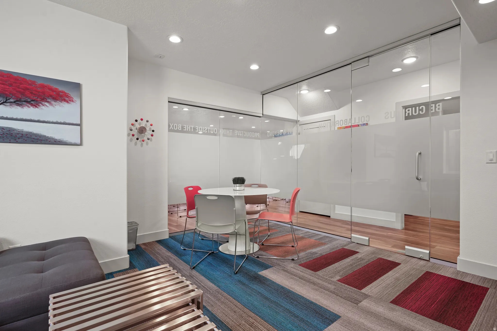 Dining room with recessed lighting and wood finished floors