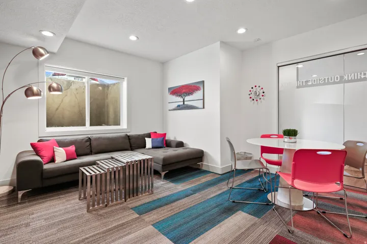 Living area with a textured ceiling and recessed lighting