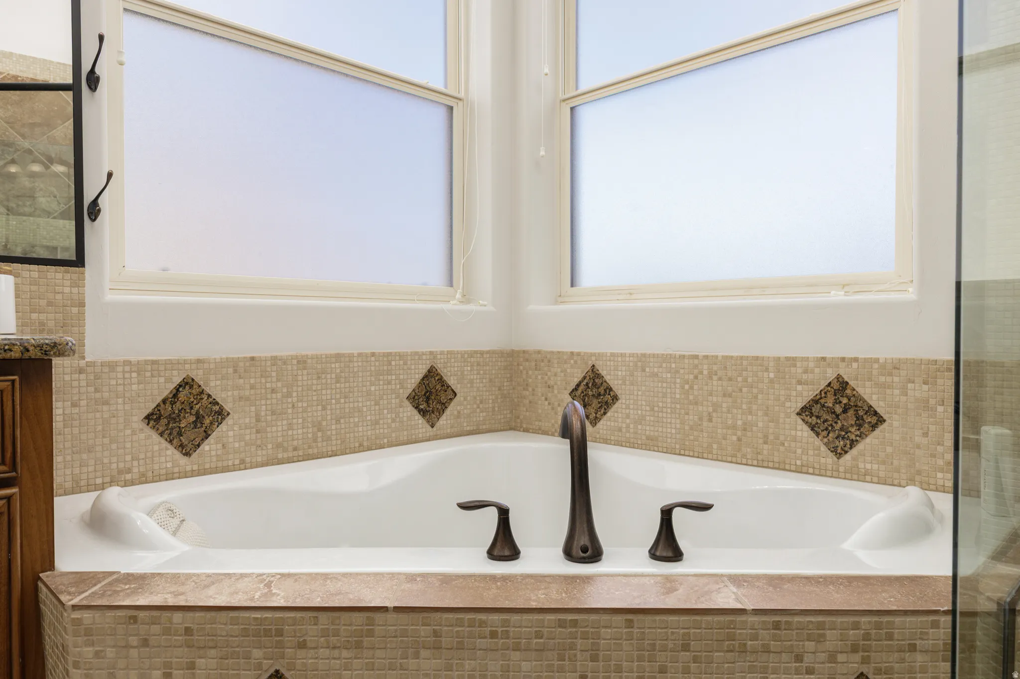 Full bath with a bath and vanity