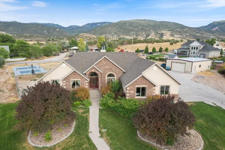 View of home with 30x42 Shop and Pickleball Court at thebase of Ephraim Canyon