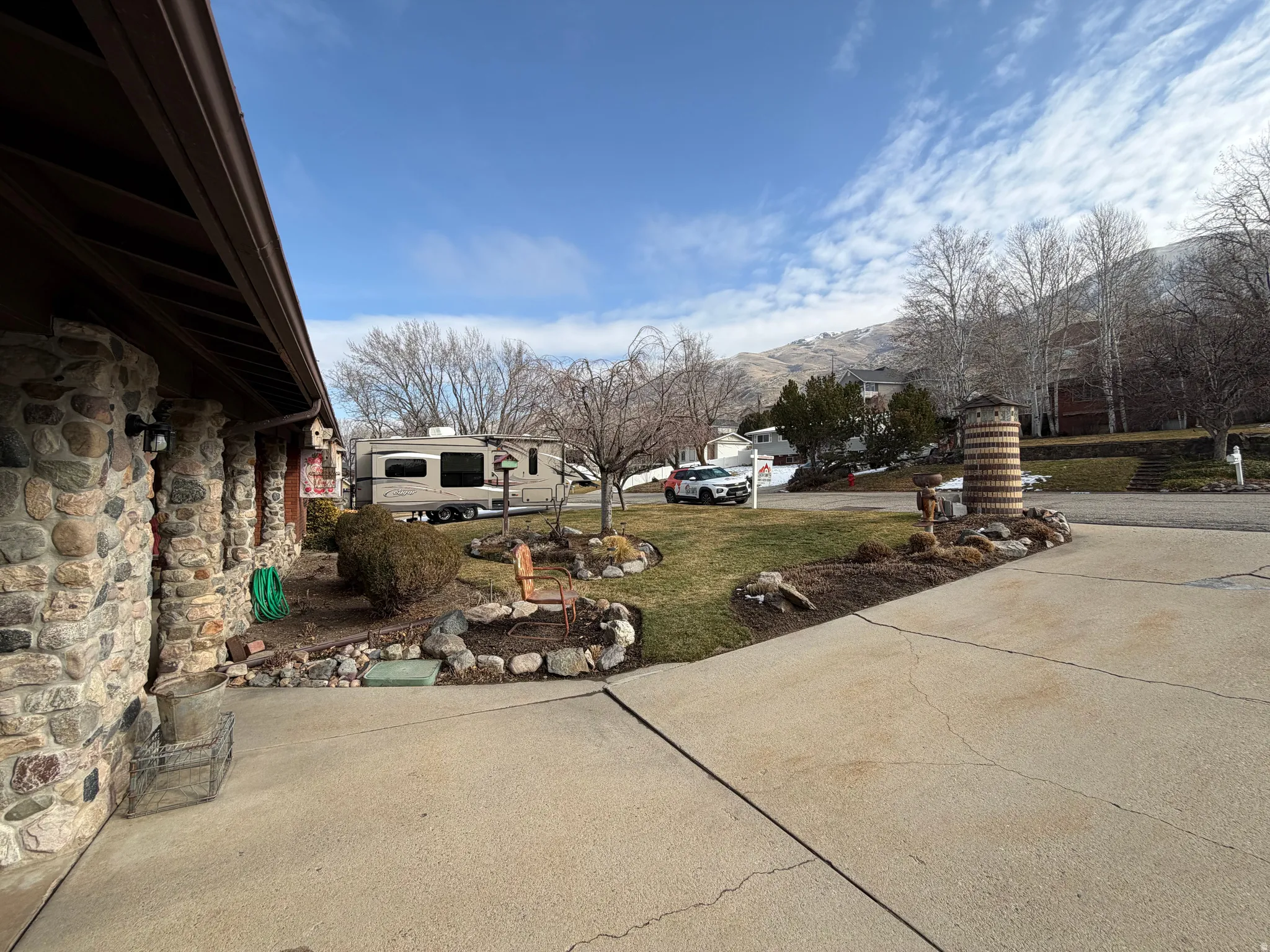 View of patio / terrace featuring a mountain view and a residential view