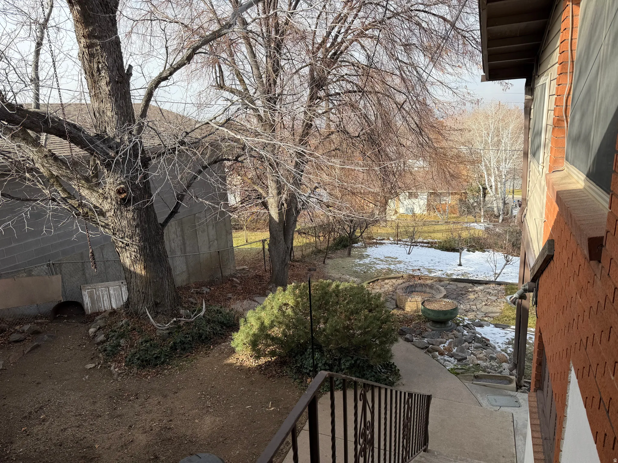 View of yard layered in snow